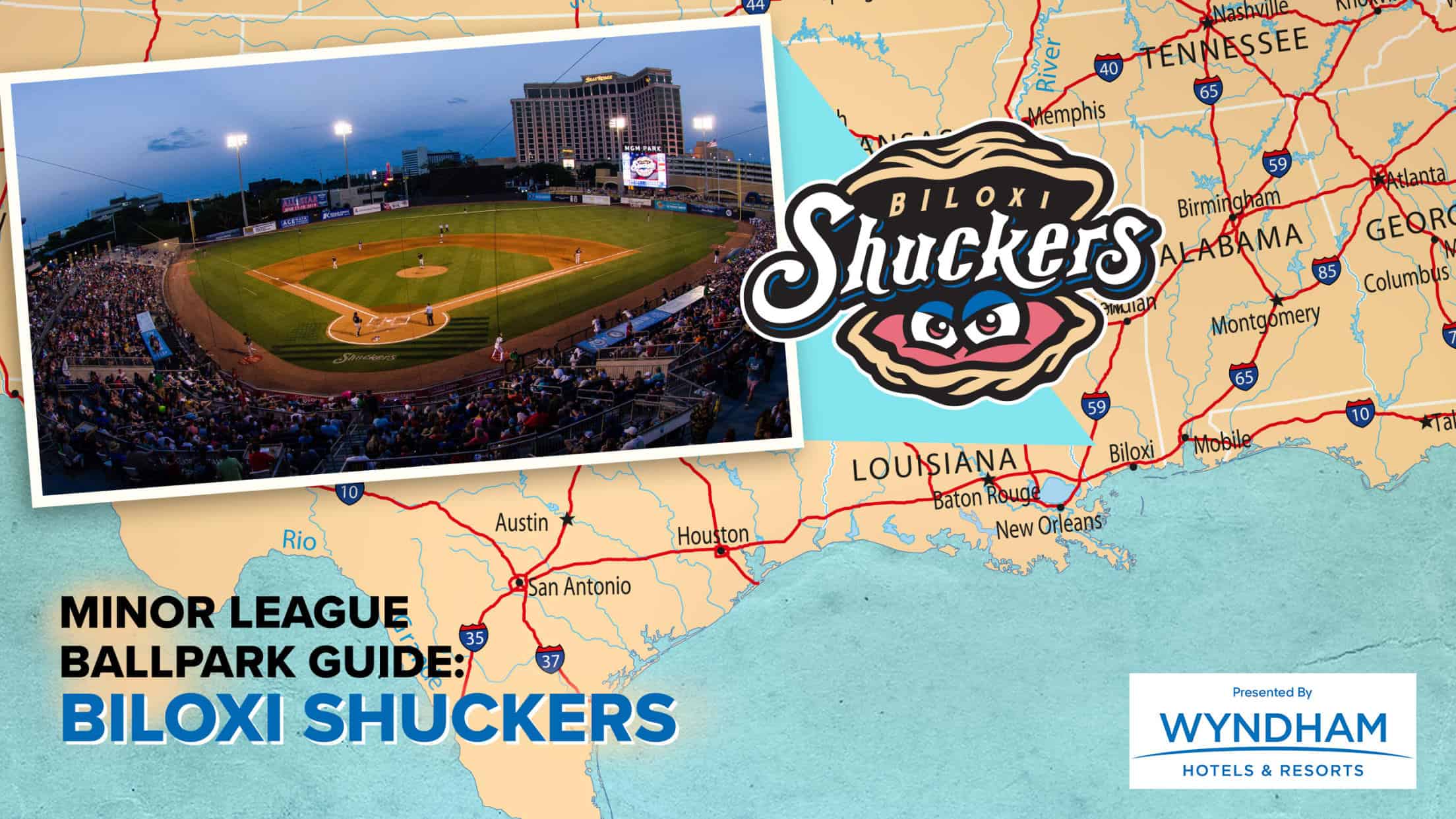 View of Biloxi Shuckers minor league baseball stadium during game, illuminated at dusk.